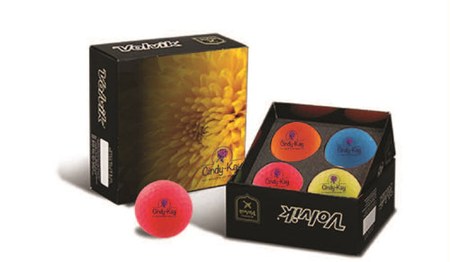 Red, orange, yellow and blue Volvik Golf balls with Cinidy-Kay logo